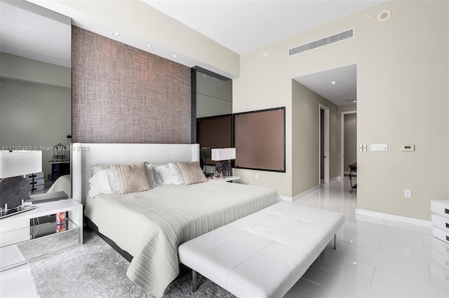 bedroom featuring baseboards, recessed lighting, and visible vents