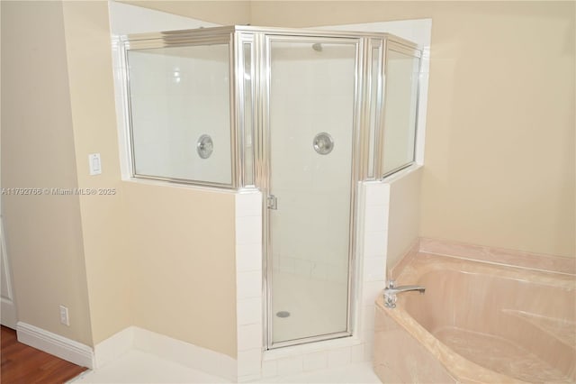 6777 NW 44th Ct, Coral Springs, FL 33067 - full bath with a garden tub and a shower stall