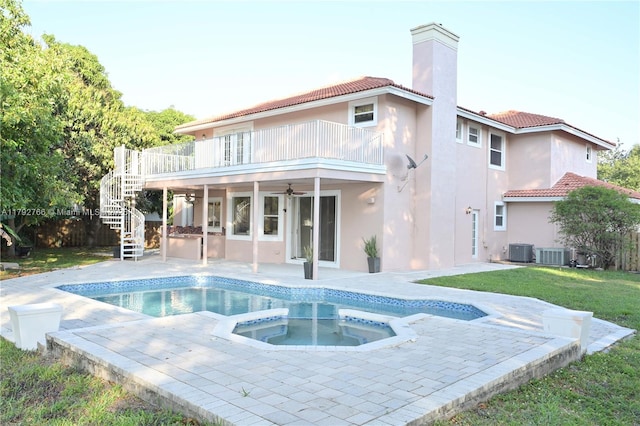 6777 NW 44th Ct, Coral Springs, FL 33067 - rear view of property with stairs, a balcony, stucco siding, ceiling fan, and a tiled roof
