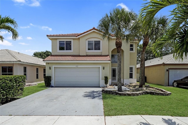 2093 NW 208th Ter, Pembroke Pines, FL 33029 - mediterranean / spanish home with an attached garage, a front lawn, a tile roof, stucco siding, and driveway