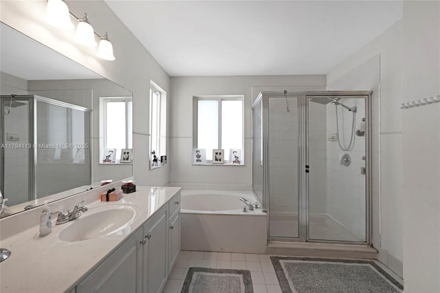 2093 NW 208th Ter, Pembroke Pines, FL 33029 - full bathroom with tile patterned flooring, a bath, a stall shower, and vanity
