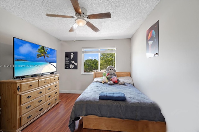 2093 NW 208th Ter, Pembroke Pines, FL 33029 - bedroom with baseboards, a textured ceiling, ceiling fan, and wood finished floors