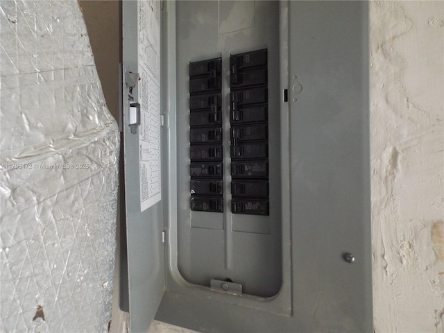 utility room featuring electric panel