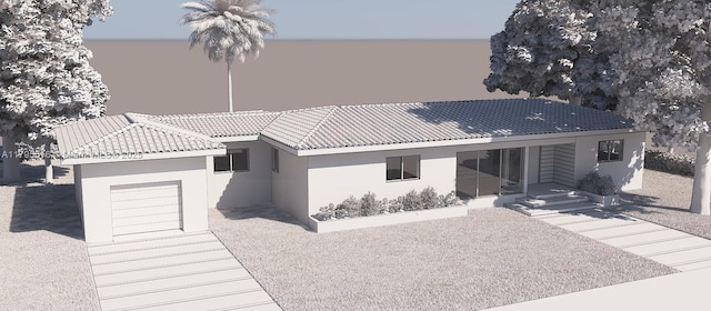 view of front facade with stucco siding and a tile roof