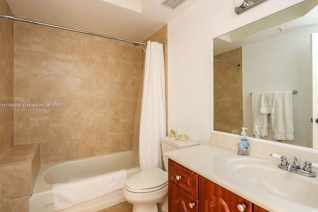 bathroom featuring vanity, toilet, shower / bathtub combination with curtain, and visible vents