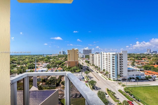 balcony featuring a city view