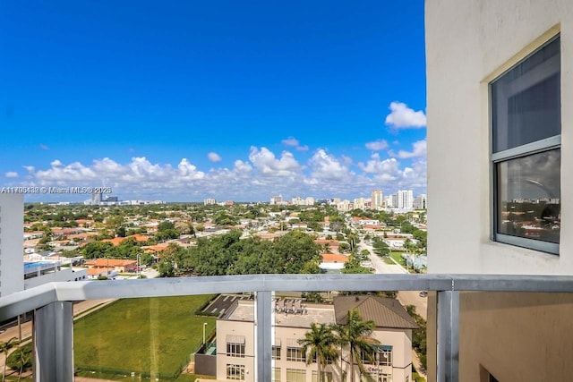 balcony featuring a city view