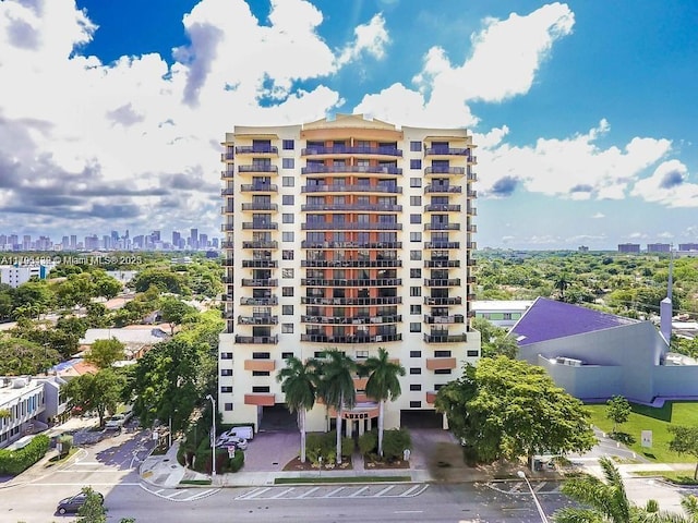 view of property with a city view