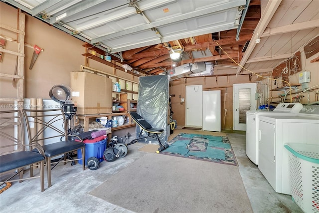 6650 SW 85th Ave, Miami, FL 33143 - garage featuring independent washer and dryer and white fridge