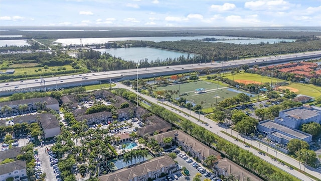 5761 NW 115th Ct Unit 105, Doral, FL 33178 - bird's eye view of a nearby body of water and a highway