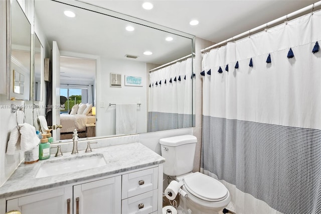full bathroom with visible vents, vanity, toilet, ensuite bathroom, and recessed lighting