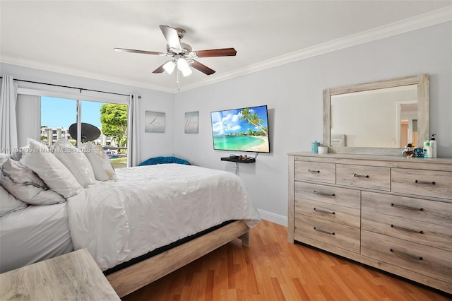 bedroom featuring ornamental molding, baseboards, ceiling fan, access to outside, and light wood-type flooring