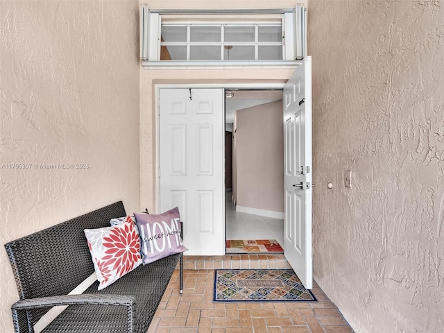 102 Gables Blvd, Weston, FL 33326 - view of exterior entry featuring stucco siding