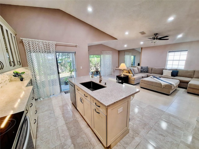 kitchen featuring visible vents, stainless steel dishwasher, electric range oven, a sink, and vaulted ceiling