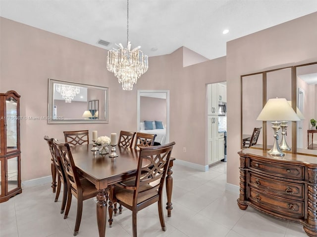 102 Gables Blvd, Weston, FL 33326 - dining space featuring a chandelier, light tile patterned floors, and baseboards