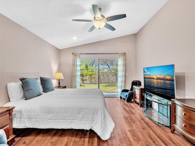102 Gables Blvd, Weston, FL 33326 - bedroom with lofted ceiling, wood finished floors, access to outside, a ceiling fan, and a textured ceiling