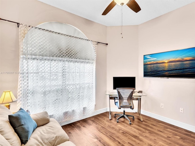 102 Gables Blvd, Weston, FL 33326 - home office with wood finished floors, a ceiling fan, and baseboards