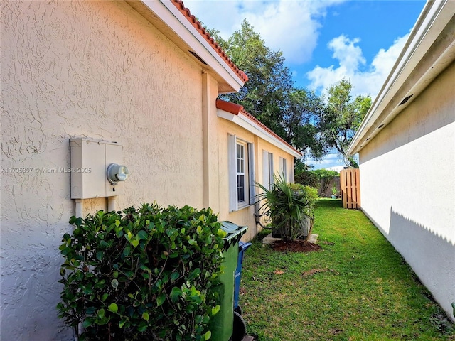 102 Gables Blvd, Weston, FL 33326 - view of property exterior with stucco siding and a tile roof