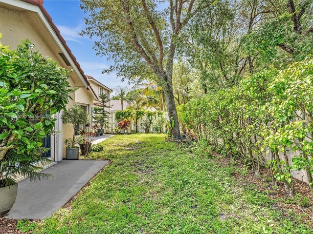 102 Gables Blvd, Weston, FL 33326 - view of grassy yard