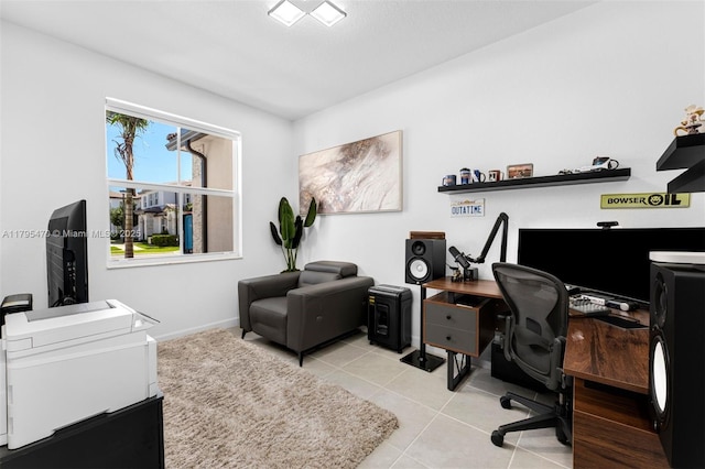 tiled home office featuring baseboards