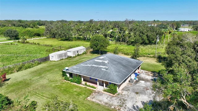 aerial view featuring a wooded view