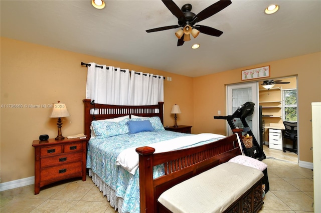 bedroom with light tile patterned floors, baseboards, and recessed lighting