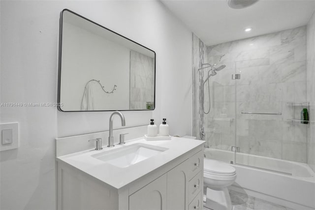 full bathroom featuring vanity, marble finish floor, toilet, recessed lighting, and bath / shower combo with glass door