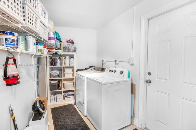 laundry room featuring laundry area and washing machine and clothes dryer