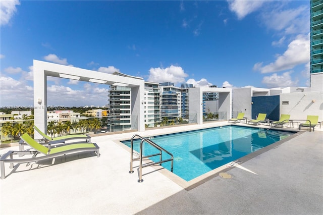 pool featuring a patio area
