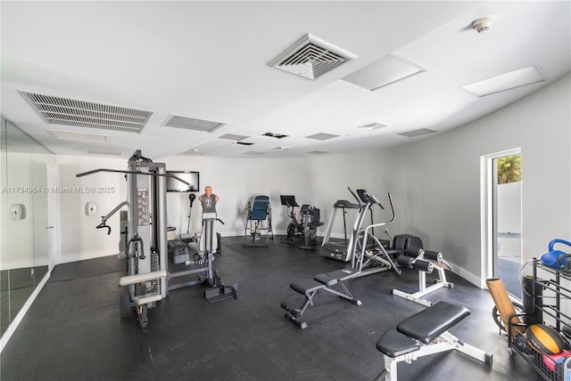 workout area featuring visible vents and baseboards