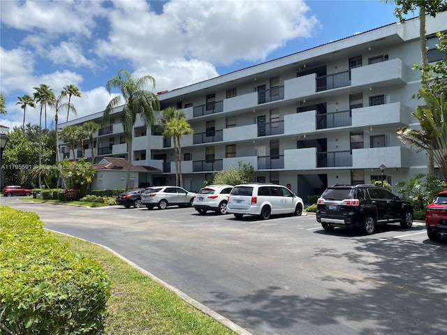 4133 S Carambola Cir S Unit G203, Coconut Creek, FL 33066 - view of apartment building / complex with uncovered parking