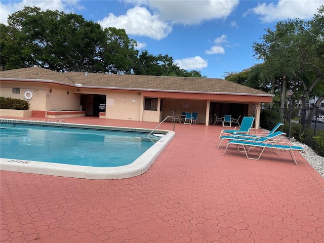 4133 S Carambola Cir S Unit G203, Coconut Creek, FL 33066 - community pool with a patio area