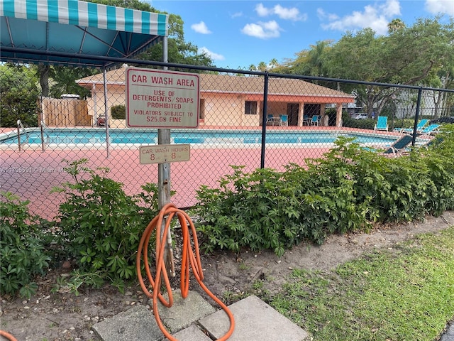community pool with fence