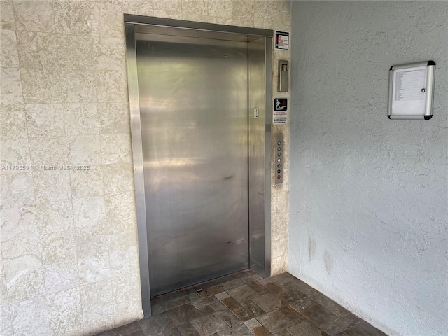 property entrance featuring elevator
