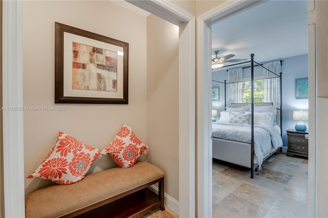 bedroom featuring baseboards