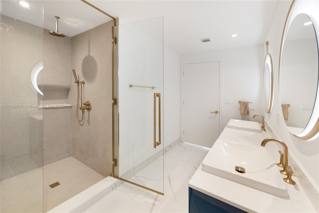 bathroom with walk in shower, a sink, double vanity, marble finish floor, and visible vents