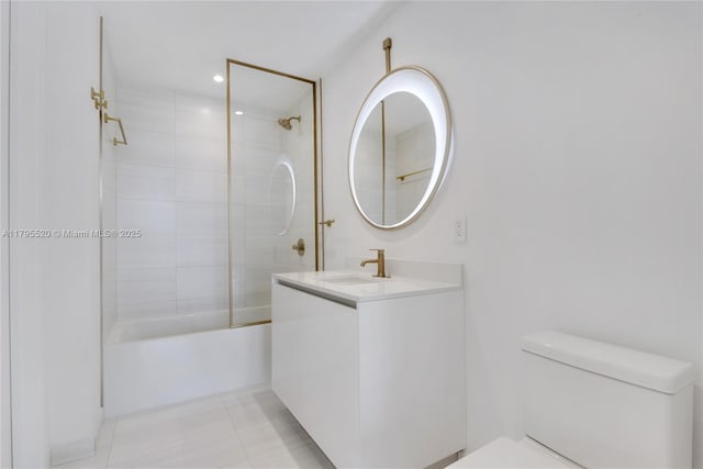 full bathroom with toilet, tile patterned floors, shower / tub combination, and vanity