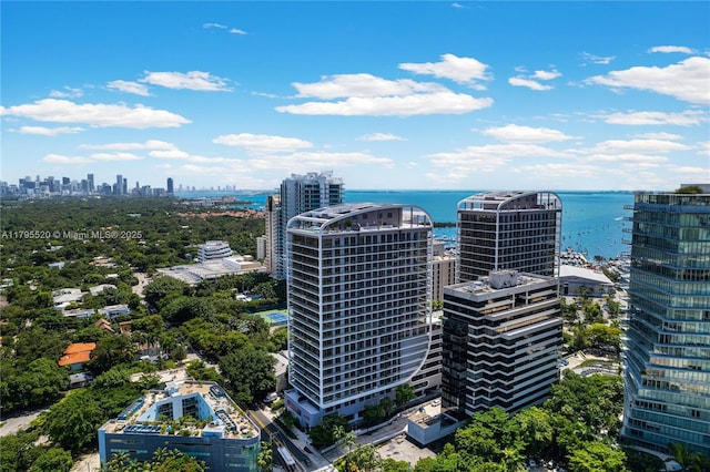 aerial view featuring a view of city and a water view