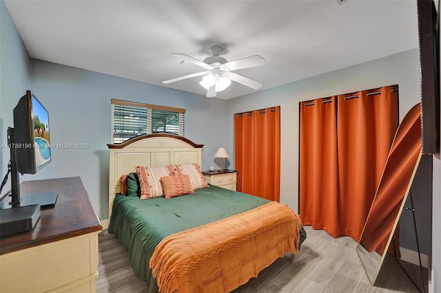 bedroom featuring ceiling fan and light wood-style floors