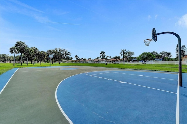 view of sport court with fence and community basketball court