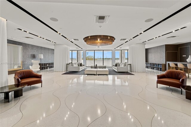 9 Island Ave Unit 1209, Miami Beach, FL 33139 - building lobby featuring expansive windows and wallpapered walls