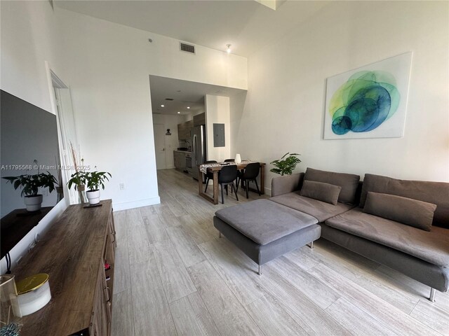 121 NE 34th St Unit L601, Miami, FL 33137 - living area with light wood-style floors