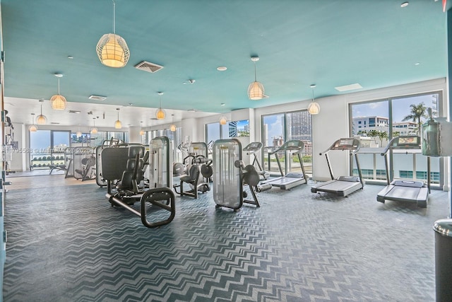 121 NE 34th St Unit L601, Miami, FL 33137 - exercise room with carpet