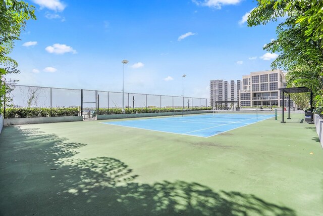 121 NE 34th St Unit L601, Miami, FL 33137 - view of tennis court featuring fence