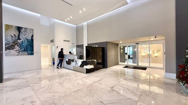 3300 NE 192nd St Unit Ph09, Aventura, FL 33180 - building lobby with a high ceiling