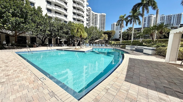 3300 NE 192nd St Unit Ph09, Aventura, FL 33180 - community pool with a patio area