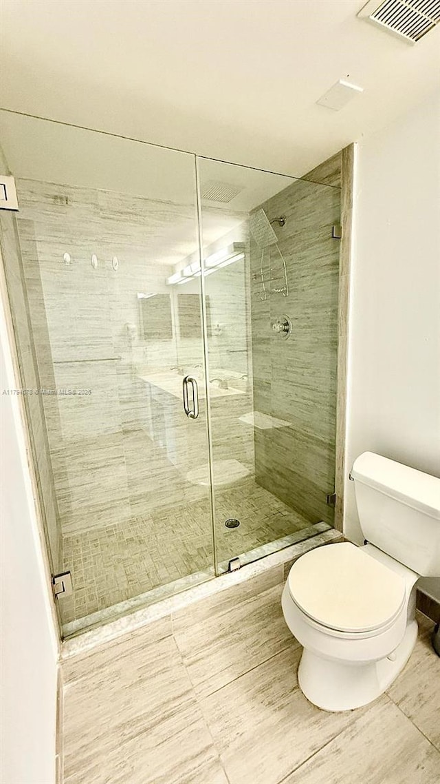 3300 NE 192nd St Unit Ph09, Aventura, FL 33180 - full bathroom with toilet and a stall shower