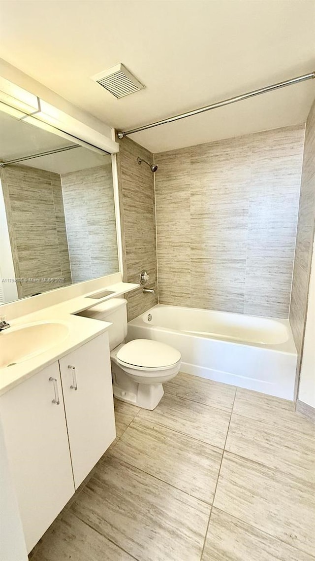 3300 NE 192nd St Unit Ph09, Aventura, FL 33180 - bathroom featuring toilet, bathing tub / shower combination, vanity, and tile patterned flooring