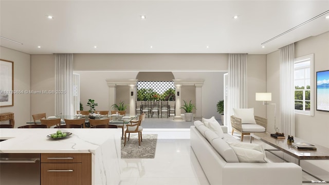 626 Malaga Ave, Coral Gables, FL 33134 - living area with decorative columns, light tile patterned floors, and recessed lighting