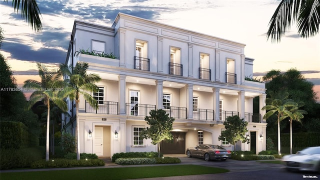 626 Malaga Ave, Coral Gables, FL 33134 - view of front of property with stucco siding and a balcony